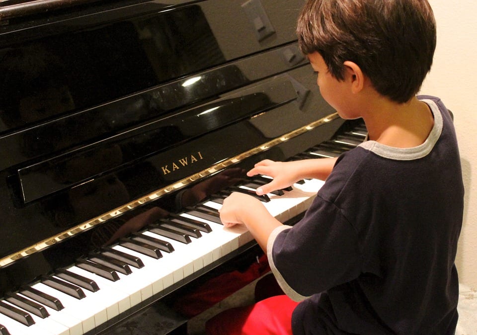 Children's brains develop faster with music training